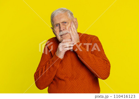 Senior old man touching cheek closing eyes with expression of terrible suffer from painful toothache Senior old man touching cheek closing eyes with expression of terrible suffer from painful toothache 110416123