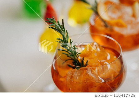 Welcome drink with cocktail glasses and drinks at an event. Alcoholic beverages at a wedding 110417728