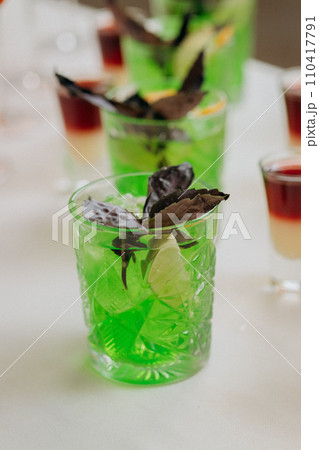 Welcome drink with cocktail glasses and drinks at an event. Alcoholic beverages at a wedding 110417791