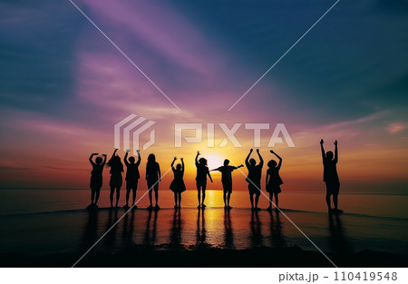 Bitch barty. Silhouette of group of people at sunset on beach party.  110419548