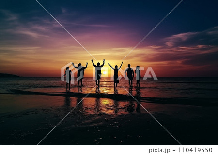Bitch barty. Silhouette of group of people at sunset on beach party.  110419550