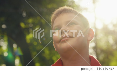 happy face boy rays sunlight, child kid face close-up, dental smile boy, healthy smile, happy childhood beautiful teeth, childhood dream, child boy eyes, happy family, head satisfied schoolboy sun 110419737