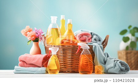 AI-generated content. Colorful clothes and towels in a wicker basket, various detergents for washing on a bright blue background 110421028