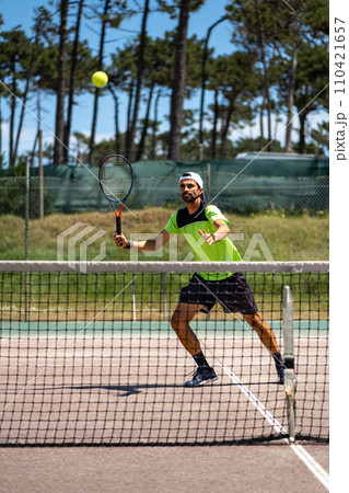 Tennis player performing a drop shot 110421657