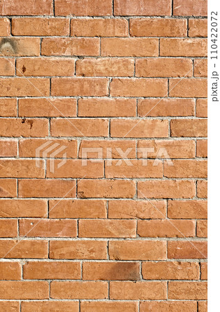 Orange brick wall 110422072