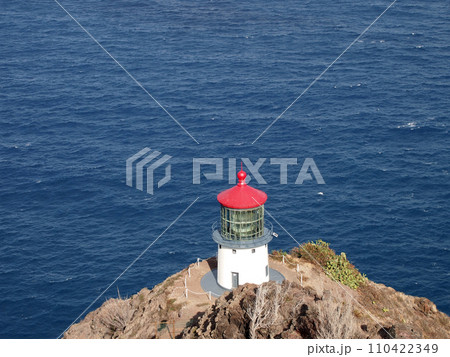 Makapu'u Lighthouse on cliffside mountain top with ocean below Makapu'u Lighthouse on cliffside mountain top with ocean below 110422349