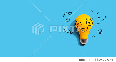 Yellow light bulb with happy face Yellow light bulb with happy face 110422574