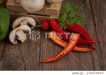 Vegetables on wooden box 110424910