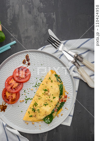 Omelet with vegetables 110424958