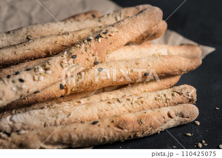 Bread sticks with salt and herbs Bread sticks with salt and herbs 110425075