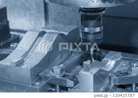 The CNC milling machine cutting mold part by solid ball end mill tool. The CNC milling machine cutting mold part by solid ball end mill tool. 110425787