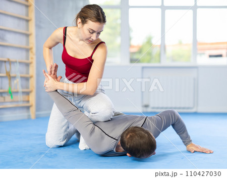 Woman and man practicing self defense techniques Woman and man practicing self defense techniques 110427030