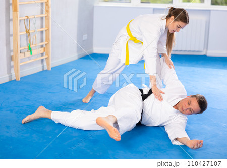 Woman and man in kimono training Woman and man in kimono training 110427107