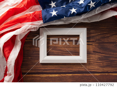 Presidents Day. flag of United States American and photo frame with space, USA flag for Memorial day on abstract wooden background, Banner template design of presidents day, Holiday background concept Presidents Day. flag of United States American and photo frame with space, USA flag for Memorial day on abstract wooden background, Banner template design of presidents day, Holiday background concept 110427792