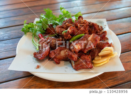 fried sour rib pork on white plate fried sour rib pork on white plate 110428956