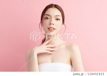 Beautiful young asian woman with clean fresh skin on pink background, Face care, Facial treatment, Cosmetology, beauty and spa, Asian women portrait. 110432915