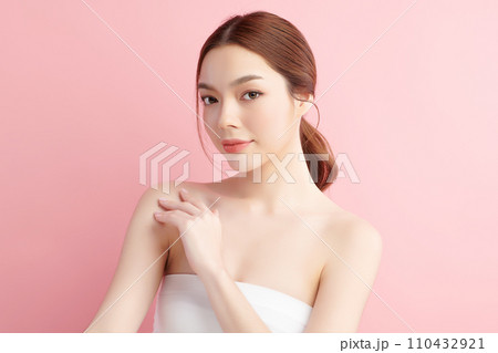 Beautiful young asian woman with clean fresh skin on pink background, Face care, Facial treatment, Cosmetology, beauty and spa, Asian women portrait. 110432921