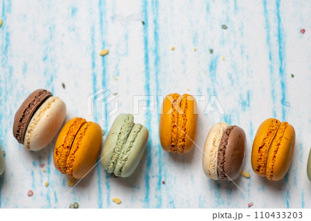 Set of colorful macaroons on light background 110433203