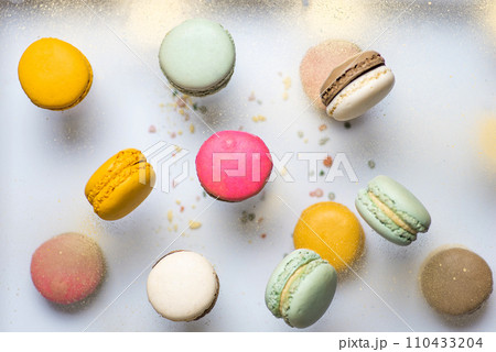 Set of flying colorful macaroons on white background 110433204