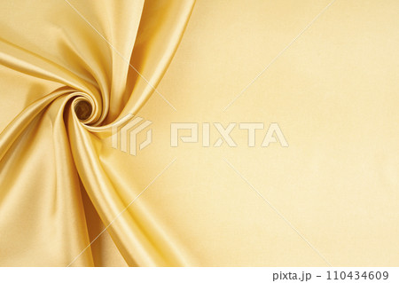 Close-up shot of gold satin texture backgrounds. 110434609