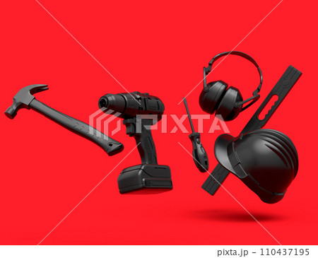 Flying view of monochrome construction tools for repair on red background 110437195