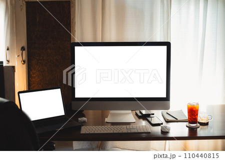 Laptop computer blank screen on table in cafe background at home 110440815