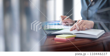 Business woman are engaged in planning work in the office. 110448227