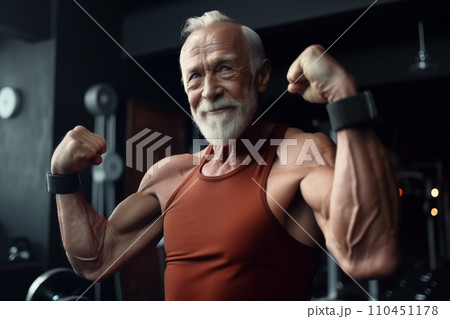 Old athle Muscula. Fitness man at workout. Elderly pensioner old man smiling in gym. Old athle Muscula. Fitness man at workout. Elderly pensioner old man smiling in gym. 110451178