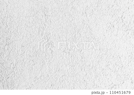 White concrete wall with rough plaster layer. Front view, background 110451679