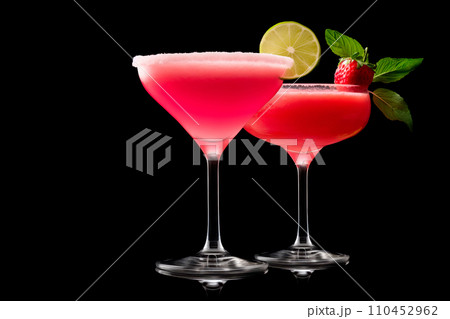Set of strawberry daiquiri garnished with slice of lime on a black background. Classic Hemingway cocktail Set of strawberry daiquiri garnished with slice of lime on a black background. Classic Hemingway cocktail 110452962