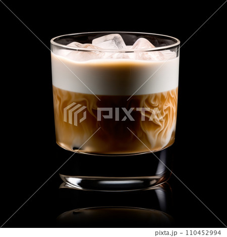 White Russian cocktail featuring layers of cream, coffee liqueur and vodka 110452994