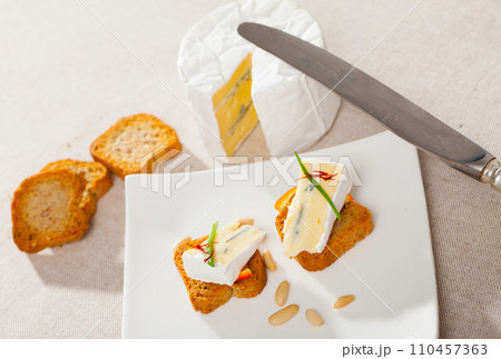 Canape with orange and blue cheese Canape with orange and blue cheese 110457363