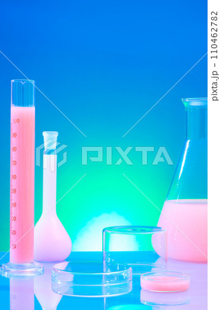 Blue gradient background with laboratory concept for advertising product. Test tube, erlenmeyer flask and petri dish filled with pink color. Space for design. Stylish background for presentation 110462782
