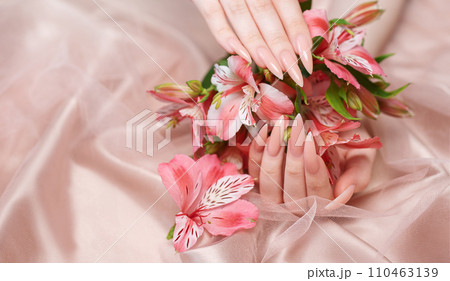 Elegant pastel pink natural manicure. 110463139