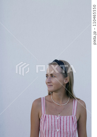 Horizontal portrait of a pleasant looking white woman with long hair. Horizontal portrait of a pleasant looking white woman with long hair. 110465550