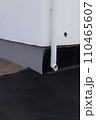 Black waterproofing membrane around the foundation of the house. Construction of the blind area of the house. Reliable protection of the foundation from moisture. 110465607