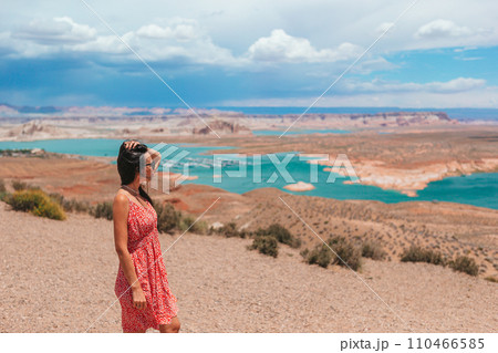 Young woman enjoying the view Lake Powell, Glen Canyon National Recreation Area 110466585