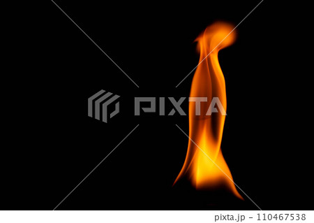 Hot flames on a black background. Beautiful flame of fire in the dark. Abstract of burning flames and smoke. 110467538
