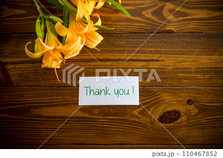 bouquet of beautiful yellow lilies on wooden table bouquet of beautiful yellow lilies on wooden table 110467852