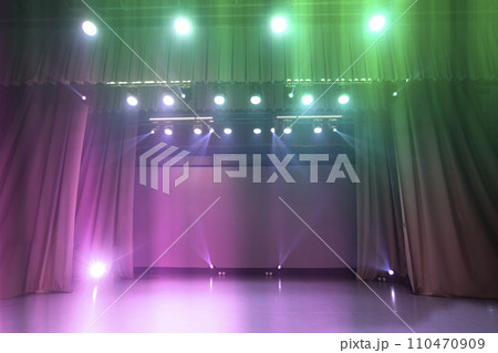 Multi-colored lighting of an empty stage before a performance or concert. Multi-colored lighting of an empty stage before a performance or concert. 110470909