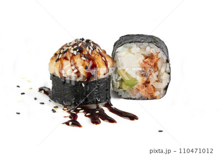 Sushi isolated on white background. Baked sushi covered with soy sauce 110471012