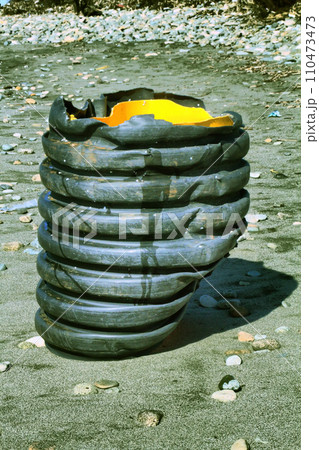 plastic pollution garbage on the sand plastic pollution garbage on the sand 110473473