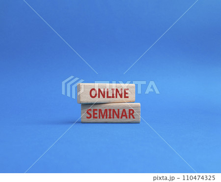 Online Seminar symbol. Concept word Online Seminar on wooden blocks. Beautiful blue background. Business and Online Seminar concept. Copy space 110474325