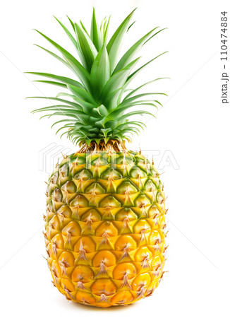 Whole pineapple with detailed texture and vibrant green crown on white background 110474884