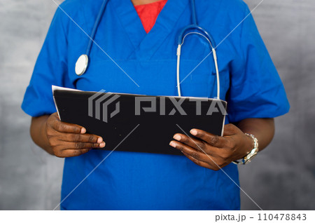 woman's hands holding a notepad woman's hands holding a notepad 110478843