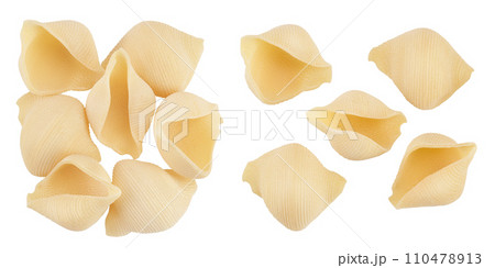 Conchiglioni italian pasta isolated on white background . Top view. Flat lay Conchiglioni italian pasta isolated on white background . Top view. Flat lay 110478913