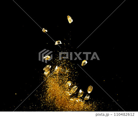 Gold Ingot Chinese Money bar token fly with dust particle in air. Chinese new year Yuanbao gold ingots floating to golden money sand particle. Language is wealthy prosperity. Black background isolated Gold Ingot Chinese Money bar token fly with dust particle in air. Chinese new year Yuanbao gold ingots floating to golden money sand particle. Language is wealthy prosperity. Black background isolated 110482612