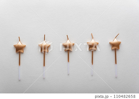 Candles in shape of star on white background, top view 110482658