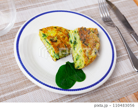 Spinach omelette served for breakfast on platter Spinach omelette served for breakfast on platter 110483056