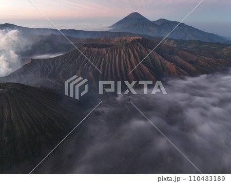Aerial view Mountains at Bromo volcano during sunrise sky,Beautiful Mountains Penanjakan in Bromo Tengger Semeru National Park,East Java,Indonesia.Nature landscape background 110483189